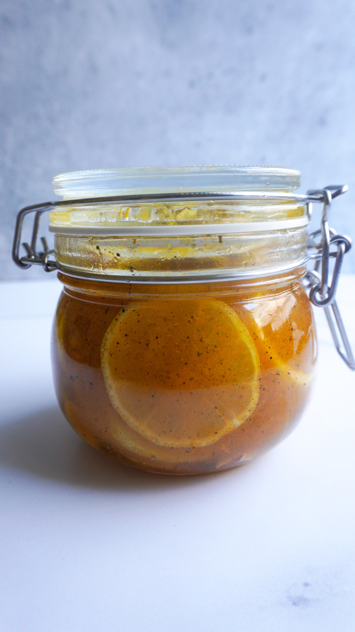 A single jar of lemon ginger honey syrup