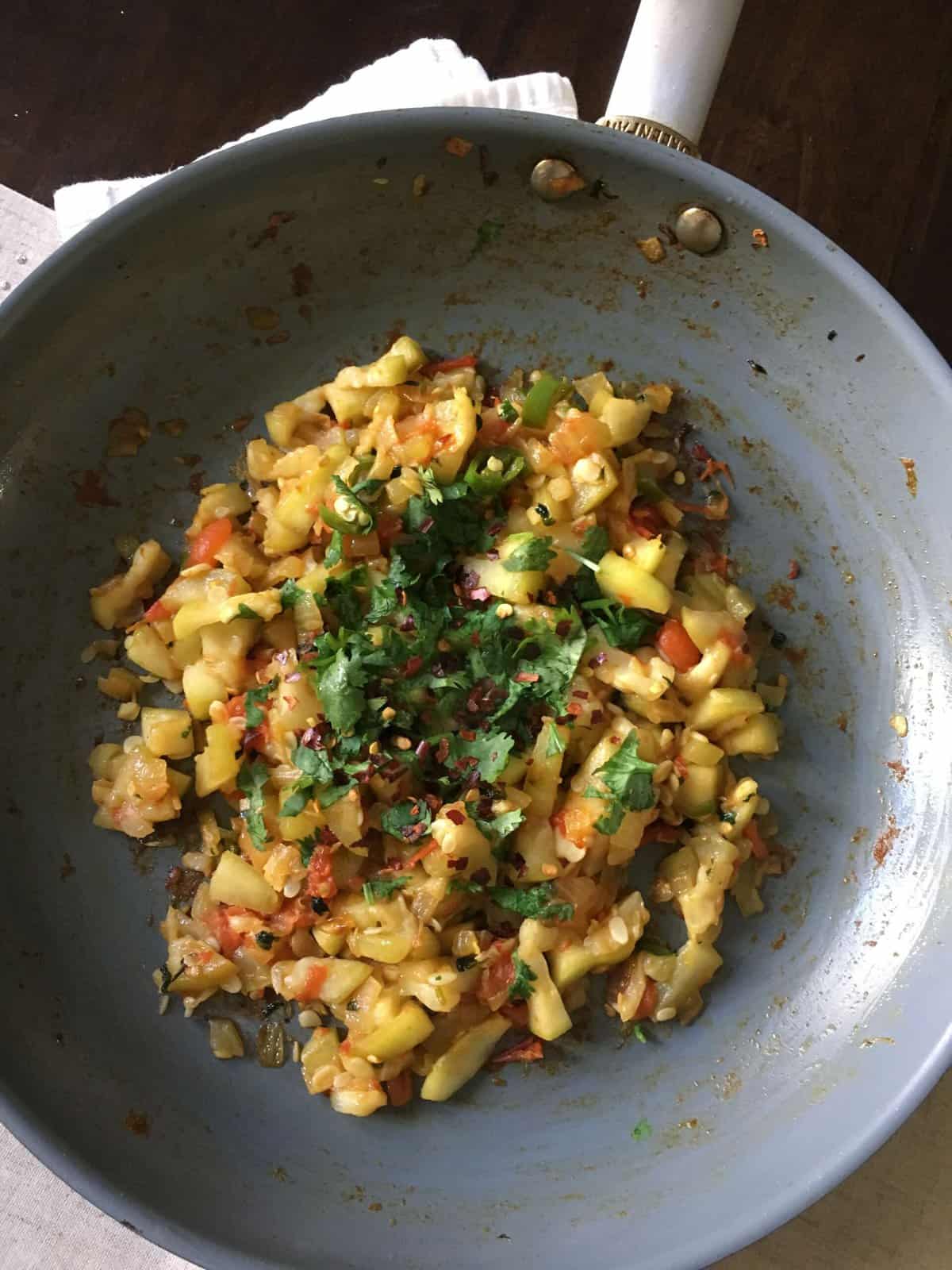 opo squash curry in a pan