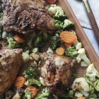 Roasted chicken and vegetables in pan