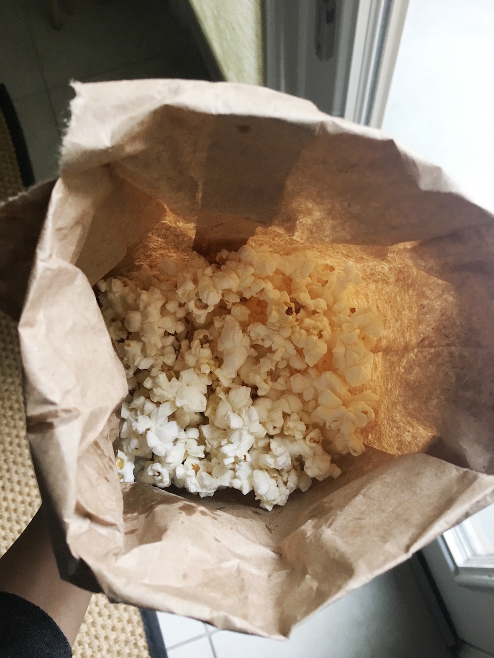 popcorn in brown bag