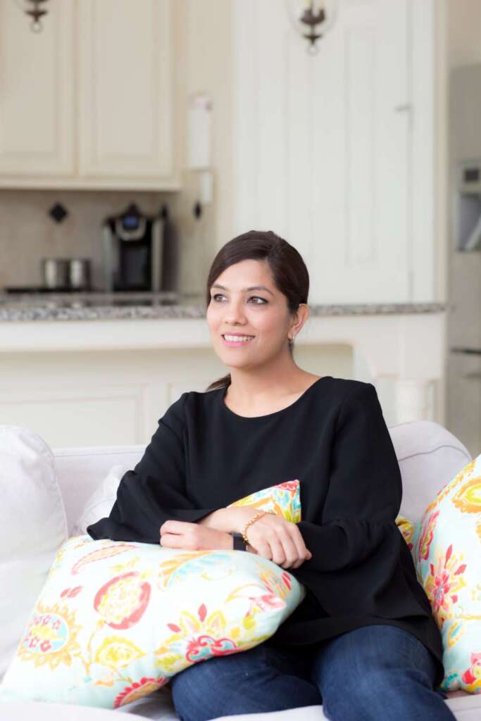 Woman sitting on couch