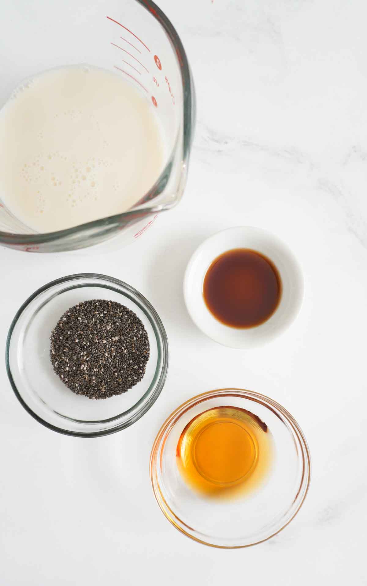 chia pudding ingredients in bowls