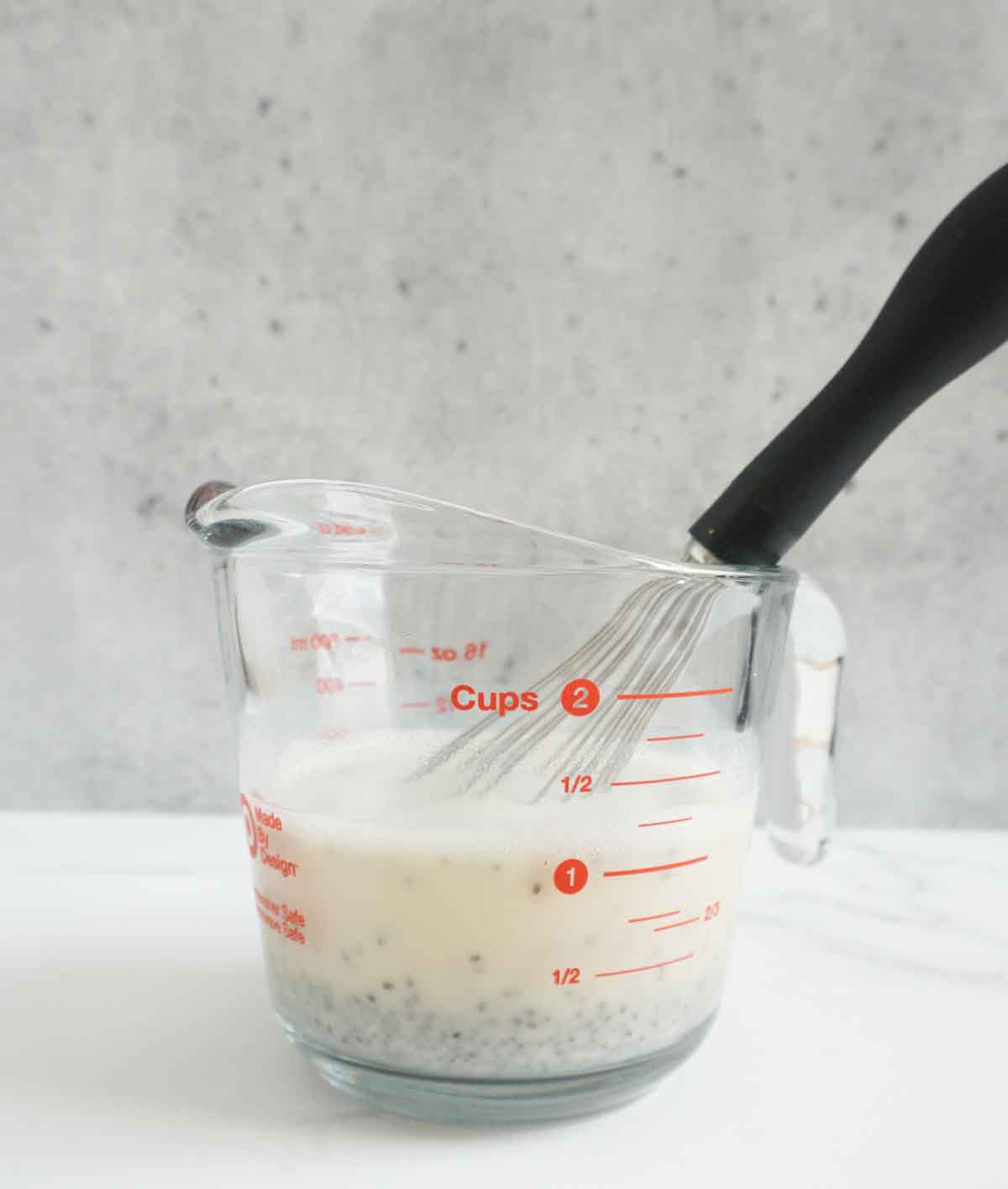 chia seeds with almond milk in a jug 
