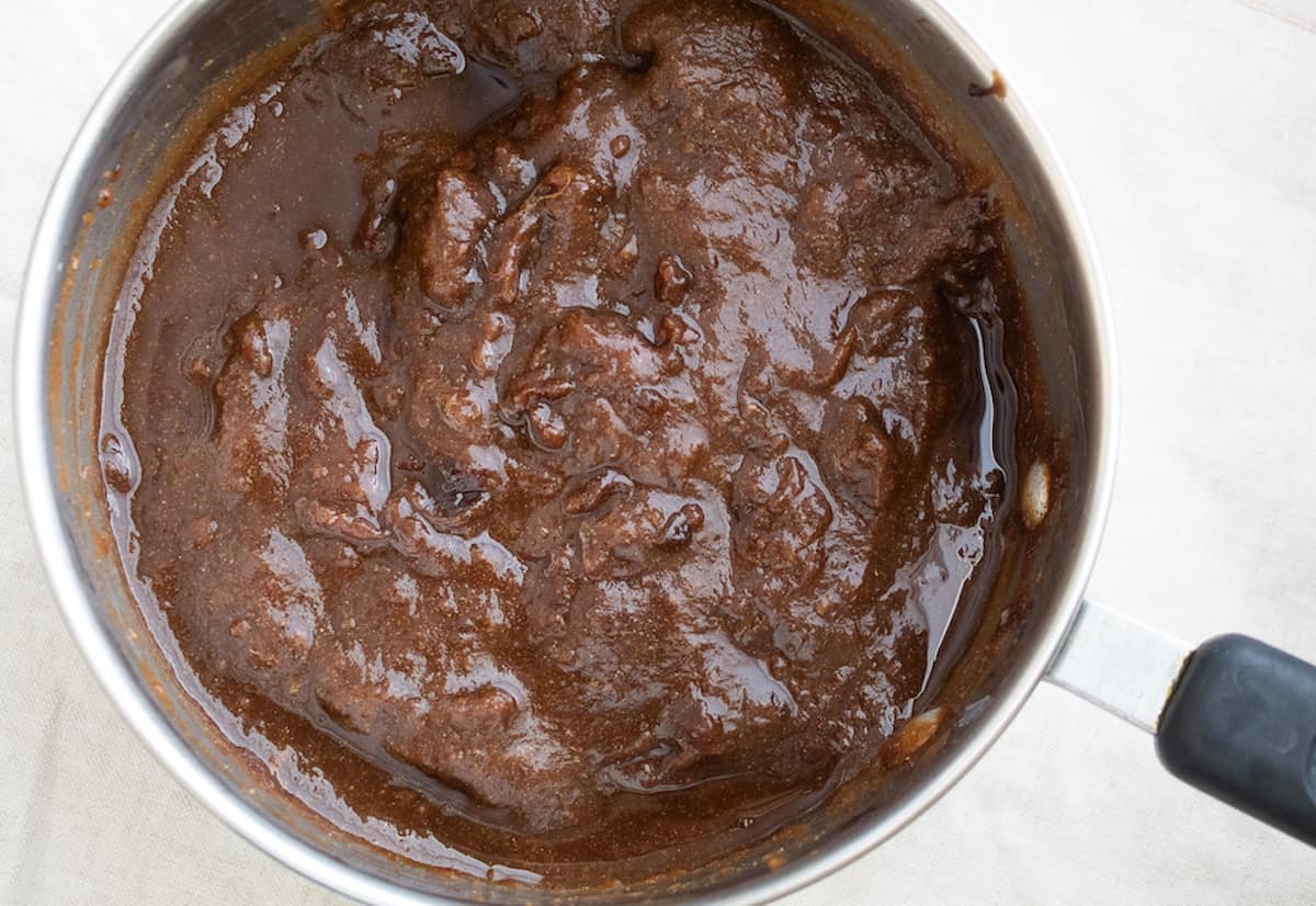 a saucepan with boiled tamarind pulp