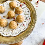 cardamom Date balls on a silver serving tray