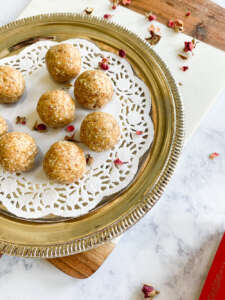 cardamom Date balls on a silver serving tray