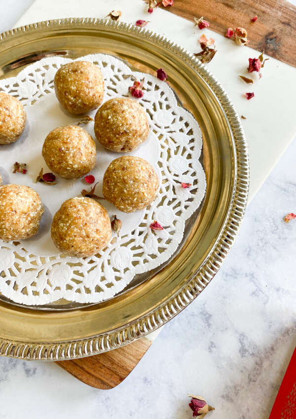 cardamom Date balls on a silver serving tray