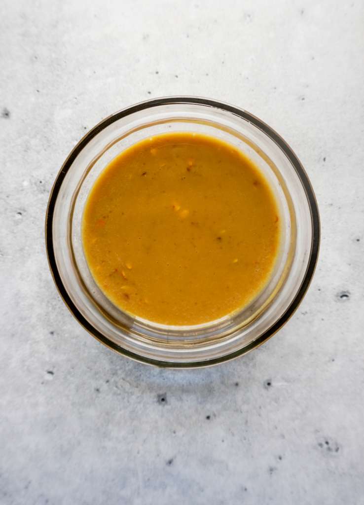 peanut dressing in a condiment bowl