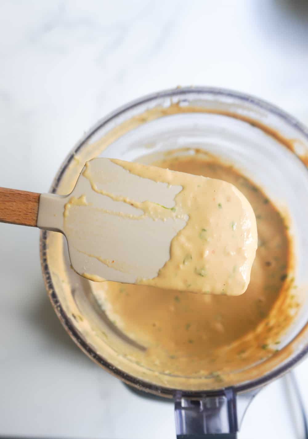 Spicy Cashew Butter Dressing on a spatula