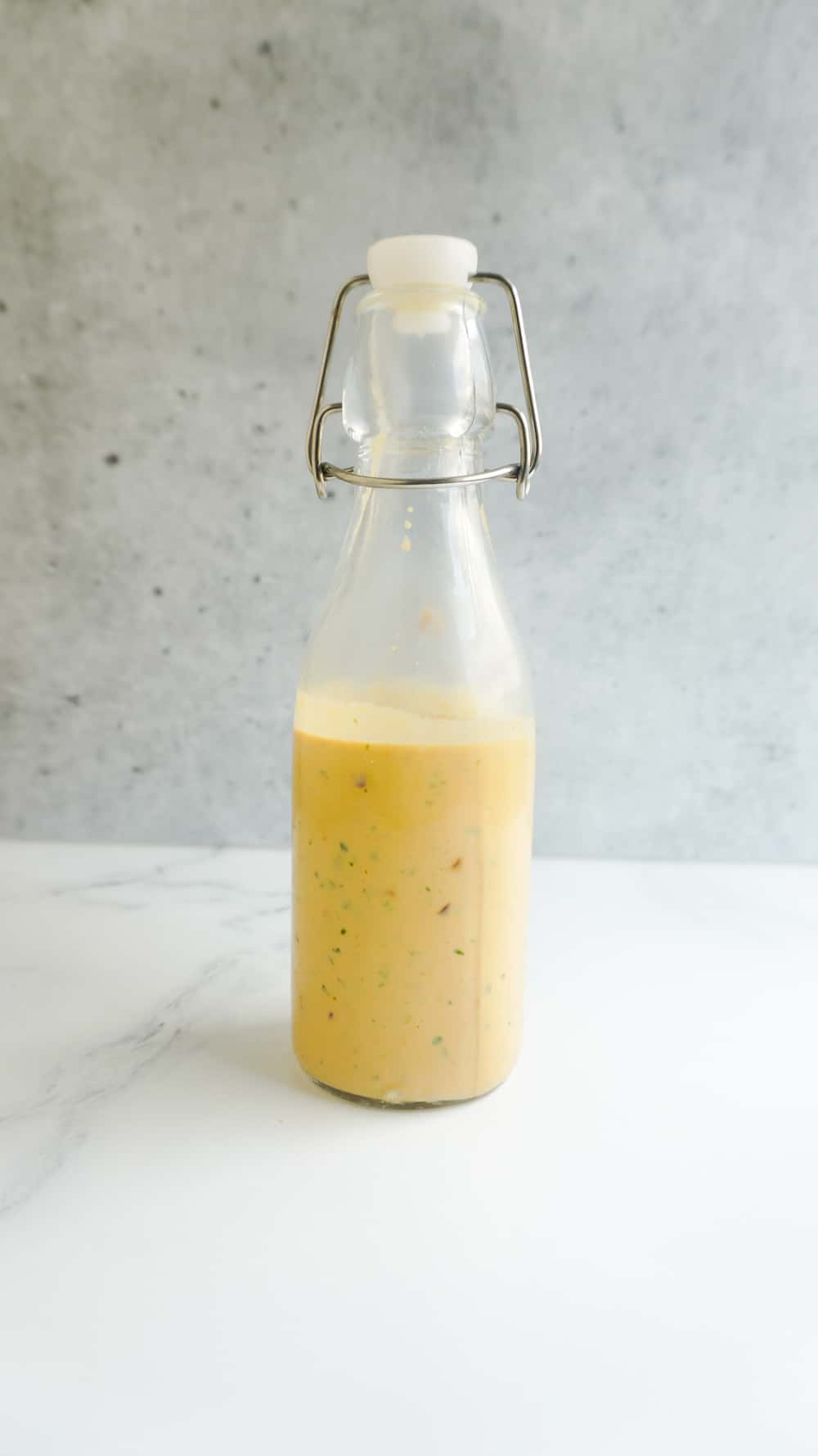 Spicy Cashew Butter Dressing in a bottle