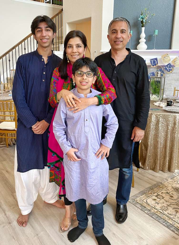 family posing for photograph