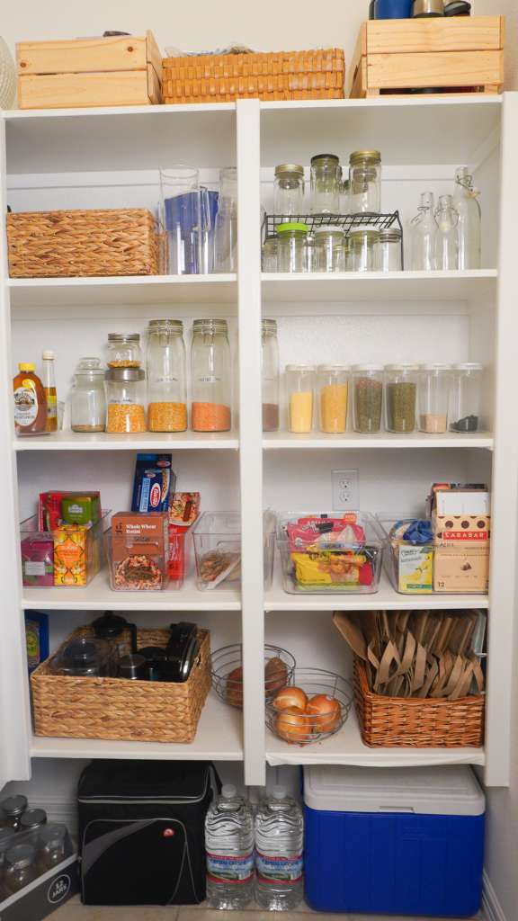 Pantry shelves with baskets and bins