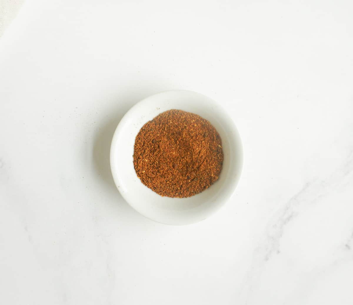 Tandoori masala in a small white dipping bowl