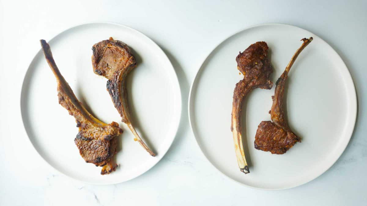 Two plates. One with 2 air fried lamb chops and the other with 2 lamb chops cooked on cast iron skillet.