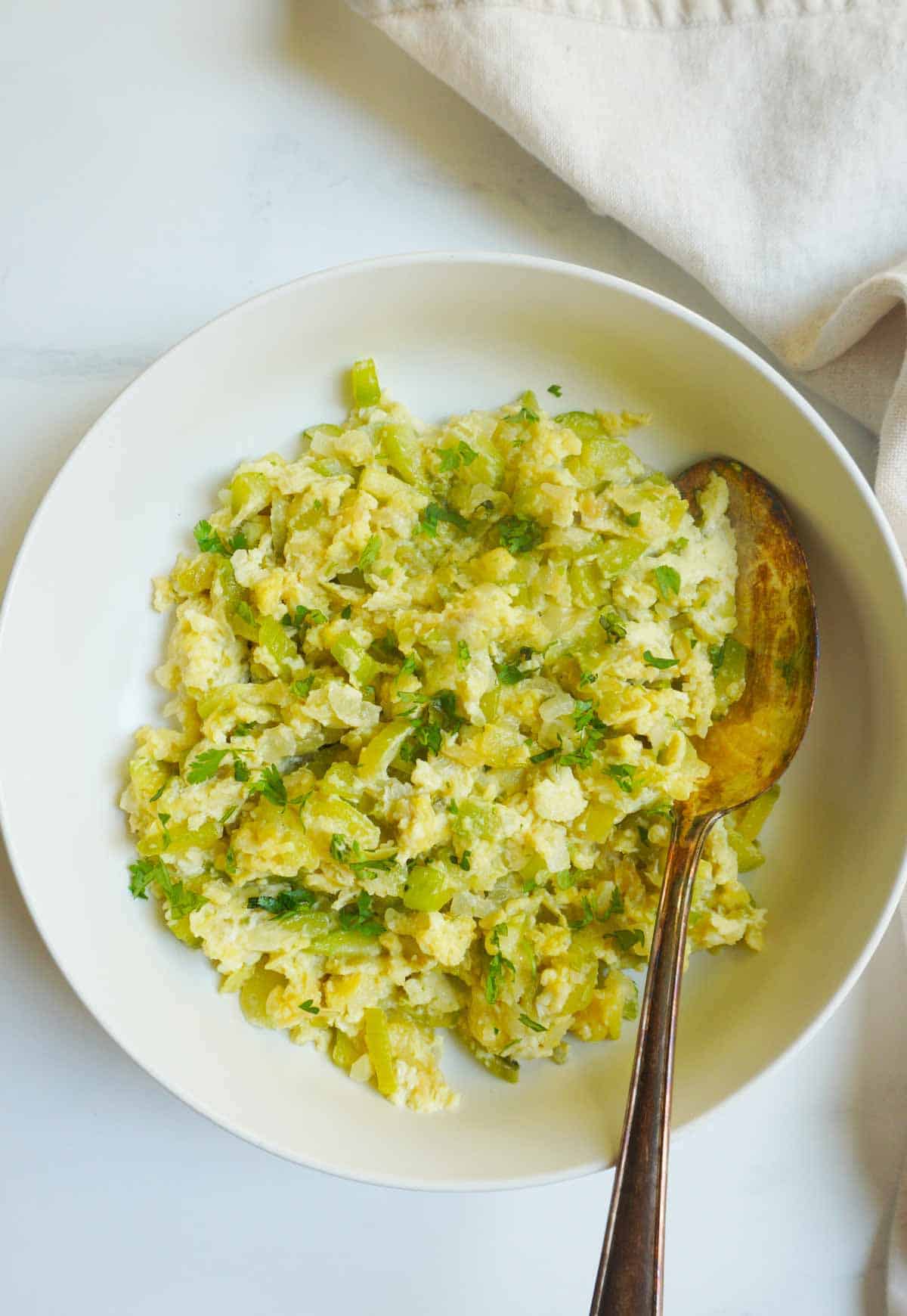 flat lay of torai anda  in a dish with a spoon