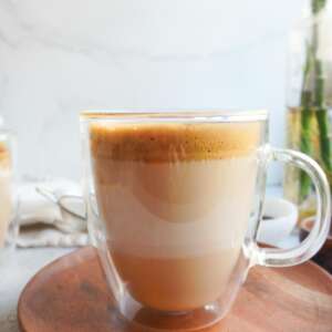 A clear mug with Pakistani phitti hui coffee