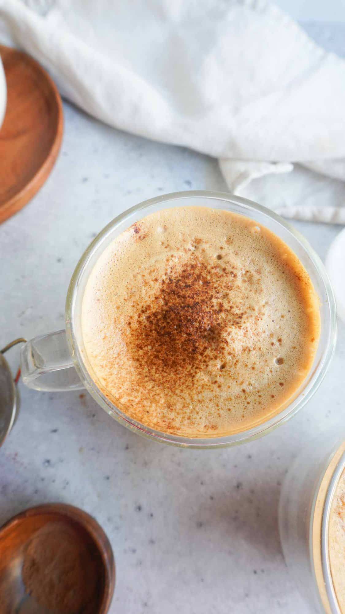 A close up flat lay of phitti hui coffee with a napkin in the background