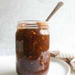 batch prepped gluten free teriyaki sauce in jar with spoon