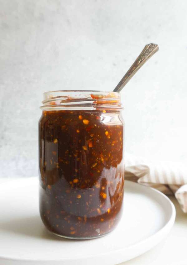 batch prepped gluten free teriyaki sauce in jar with spoon