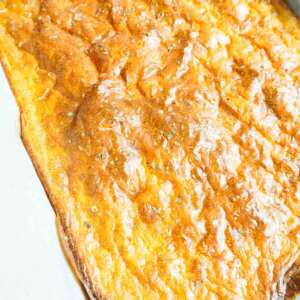 2 ingredient cottage cheese flatbread in parchment lined sheet pan
