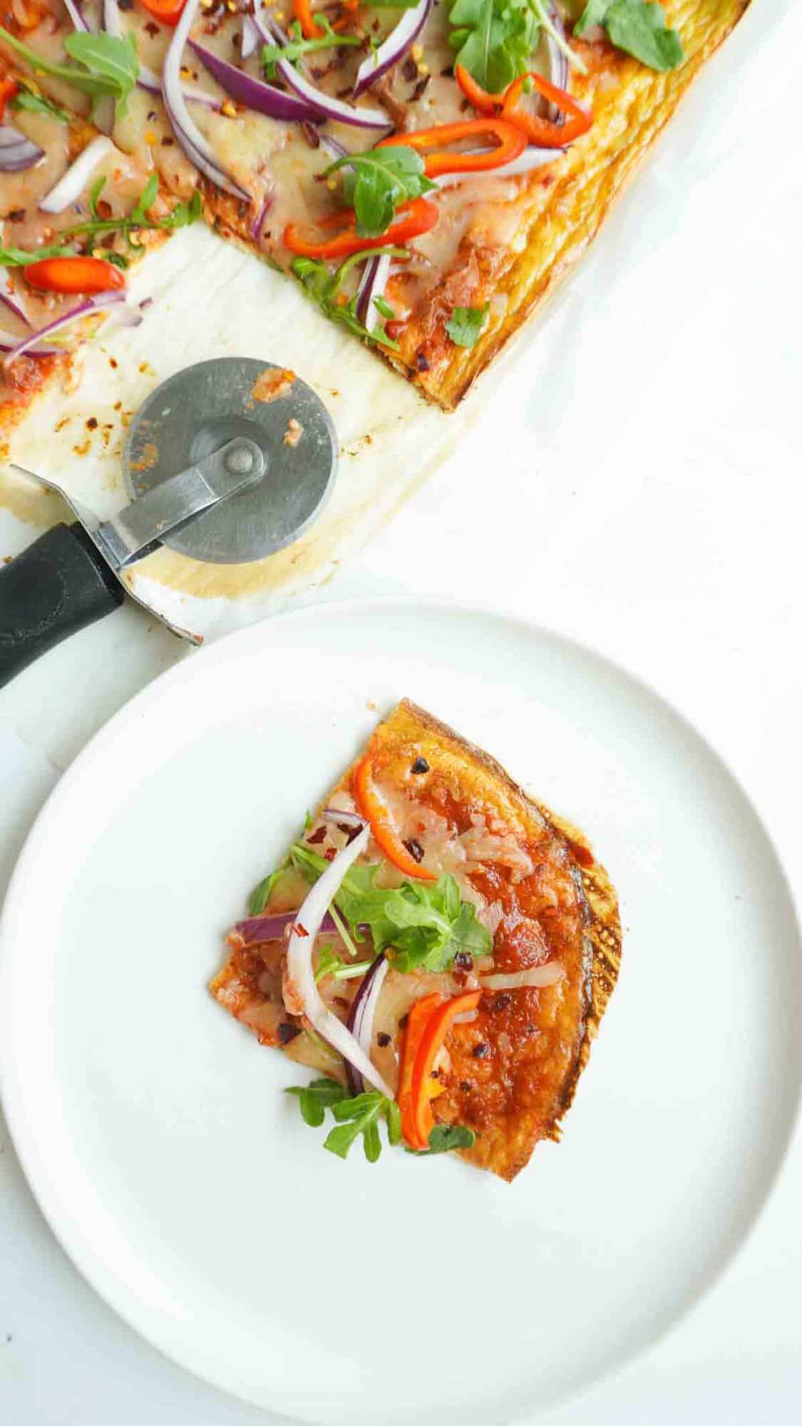a small square serving of cottage cheese flatbread pizza.