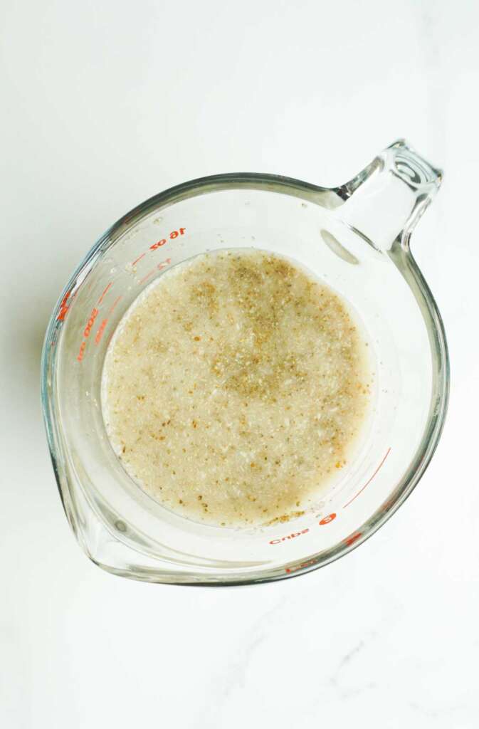 Mixture of yeast, water and maple syrup in a measuring jug