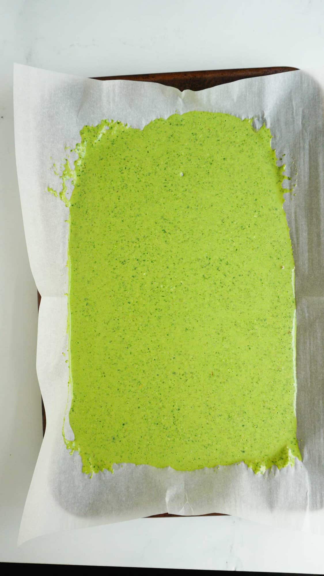 viral spinach cottage cheese flatbread batter in sheet pan