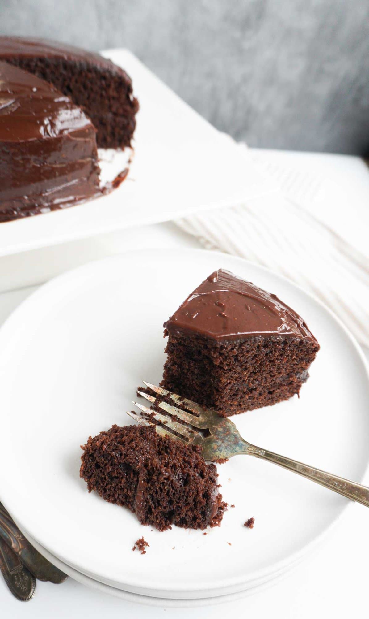 a slice of alond flour chocolate cake with a fork