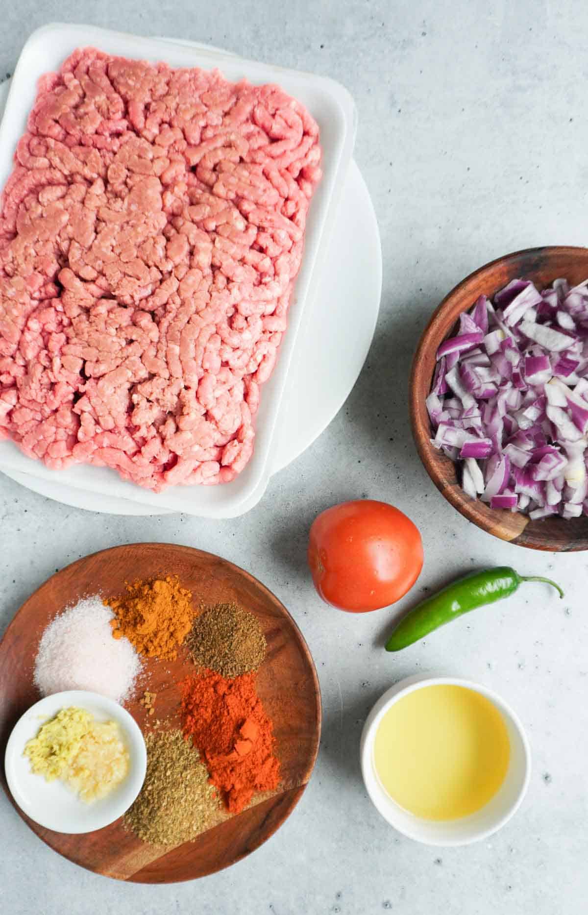 A flat lay of keema recipe ingredients