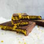 A stack of chocoalte broken up with filling oozing out