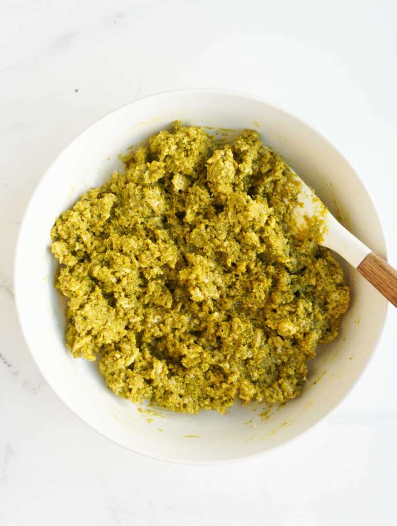 a bowl with mixed rice chex, pistachio butter and tahini