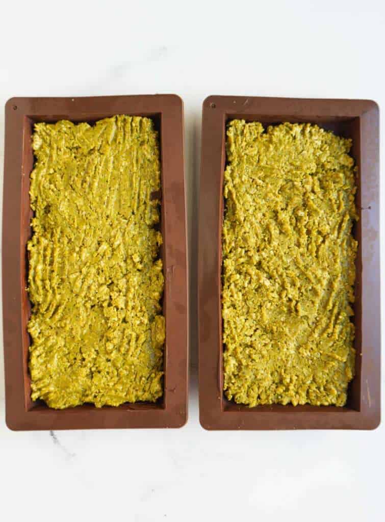 2 chocolate molds with pistachio filling